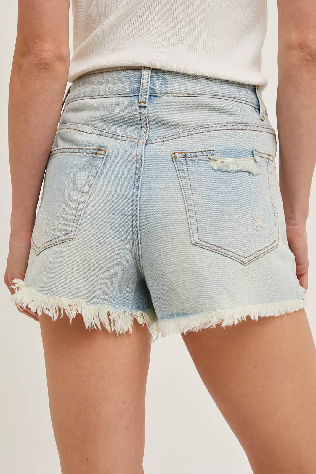 HIGH RISE DISTRESSED DENIM SHORTS
