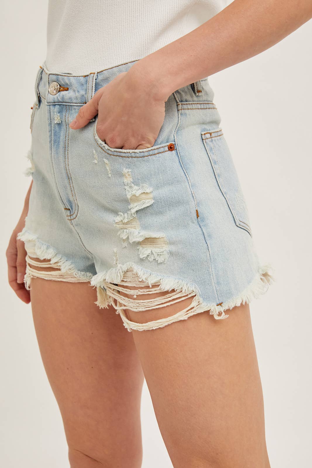 HIGH RISE DISTRESSED DENIM SHORTS