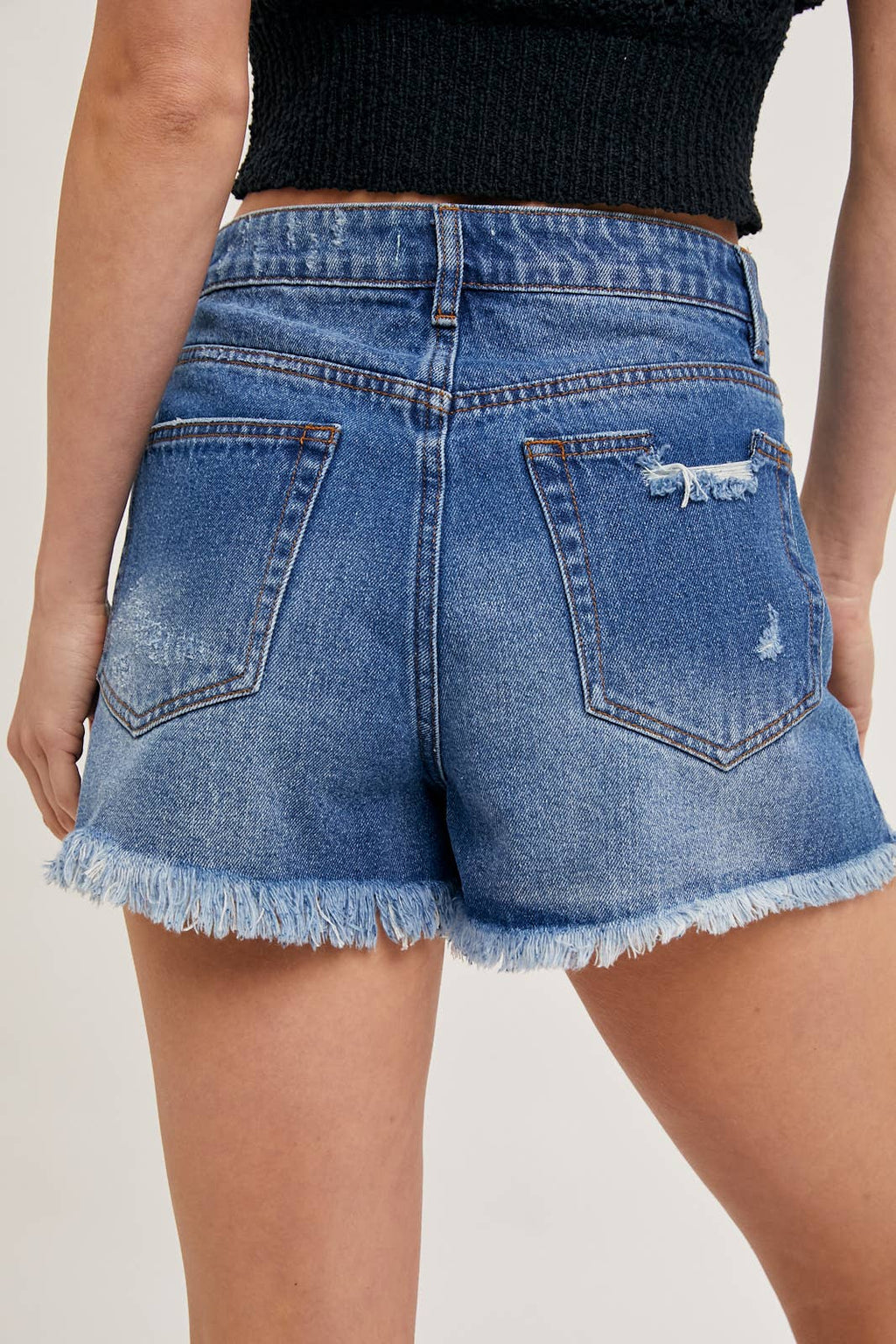 HIGH RISE DISTRESSED DENIM SHORTS